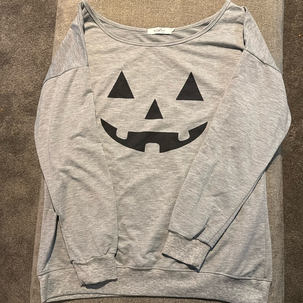 Off shoulder pumpkin shirt.  Size Medium